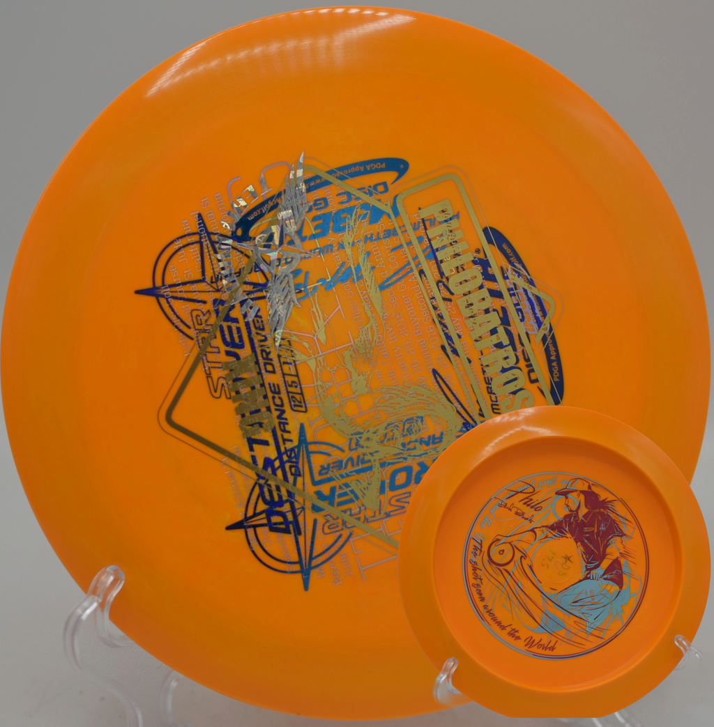 Innova Team Stamp 4X Paul McBeth Destroyer McFools edition distance driver showcasing multiple foil variations at Fountain Hills Disc Golf Course in Fountain Hills, Arizona.