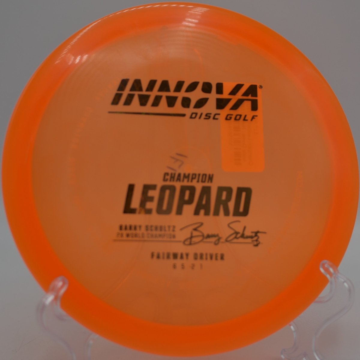 Innova Champion Leopard driver shaping a straight tunnel shot at Sandy Hollow Disc Golf Course in Rockford, Illinois