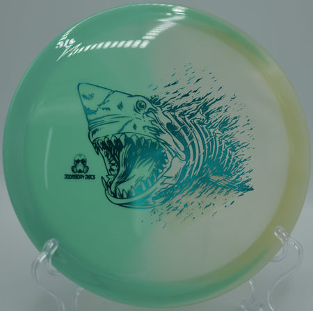 Retina Glow Chemtrail fairway driver from Doomsday Discs glowing brightly on a night-golf tee pad at Lime Hollow DGC in Cortland, NY, ideal for hyzer-flip control shots.