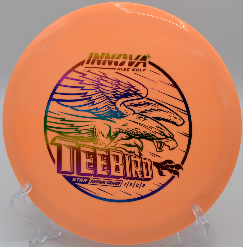 A player executing a forehand placement shot with a Star Teebird at Eagles Crossing Disc Golf Course in Hawk Point, Missouri.