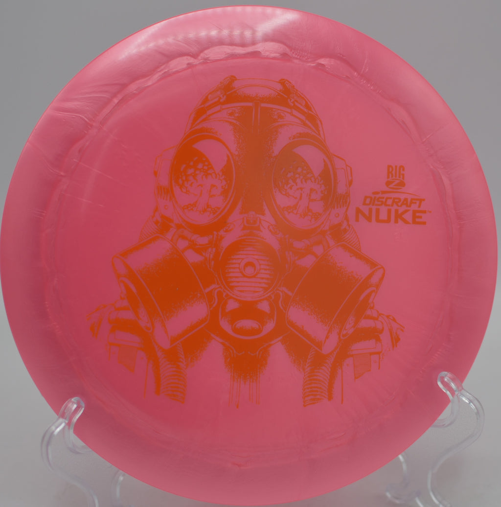 Discraft Big Z Nuke carving a long S-curve down the fairway at DeLaveaga Disc Golf Course in Santa Cruz, California.