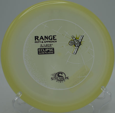 Streamline Eclipse Glow Range putter flying on a straight approach at Maple Hill Disc Golf Course in Leicester, Massachusetts.