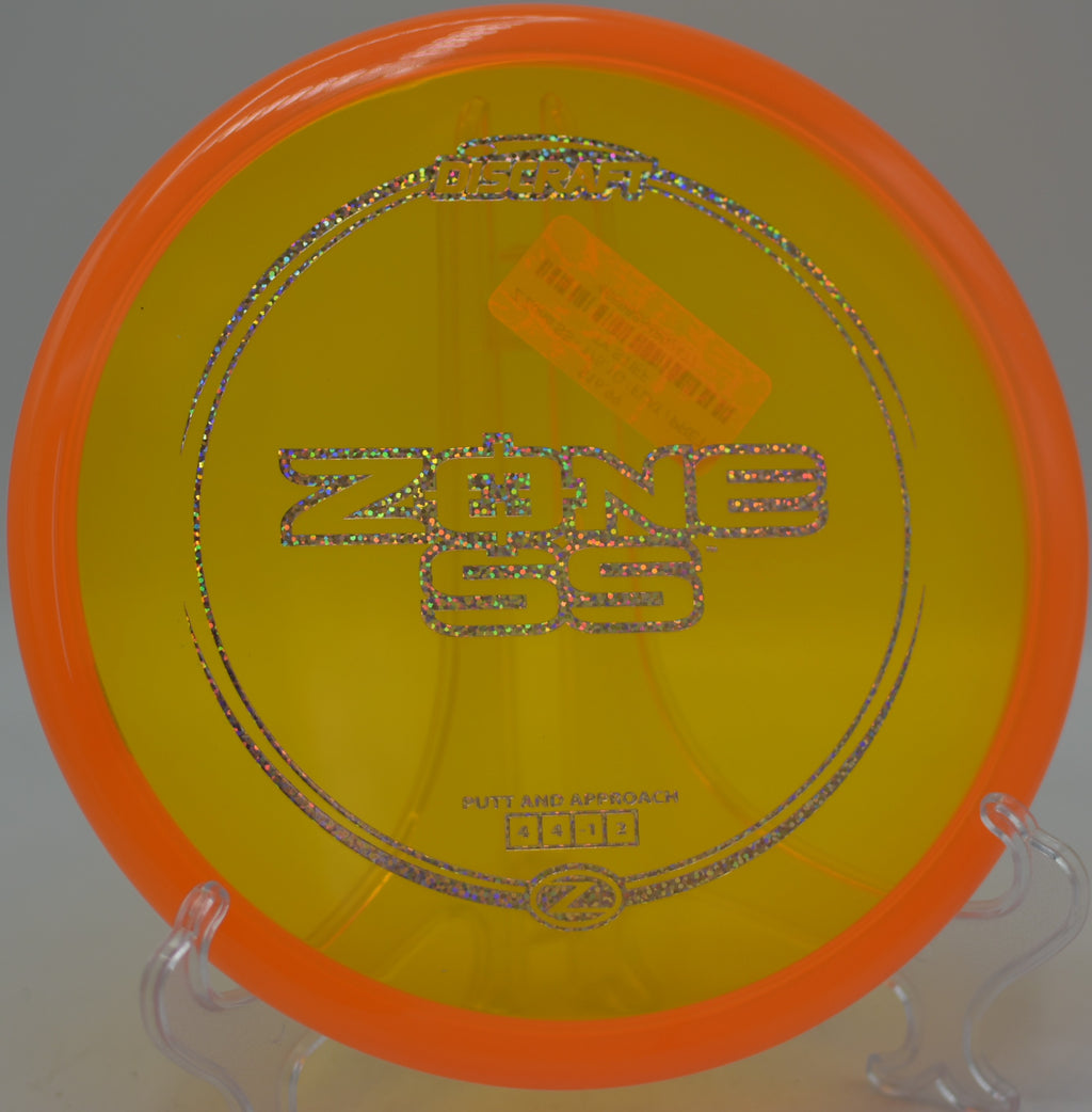 Discraft Z Zone SS clean forehand release at BlueGill Disc Golf Course in Wayland, Michigan.