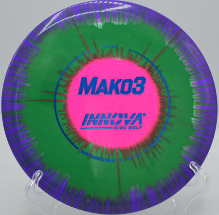I-Dye Star Mako3 midrange disc flying straight through wooded tunnel at Trophy Lakes Disc Golf Course in Charleston, SC
