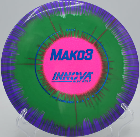 I-Dye Star Mako3 midrange disc flying straight through wooded tunnel at Trophy Lakes Disc Golf Course in Charleston, SC