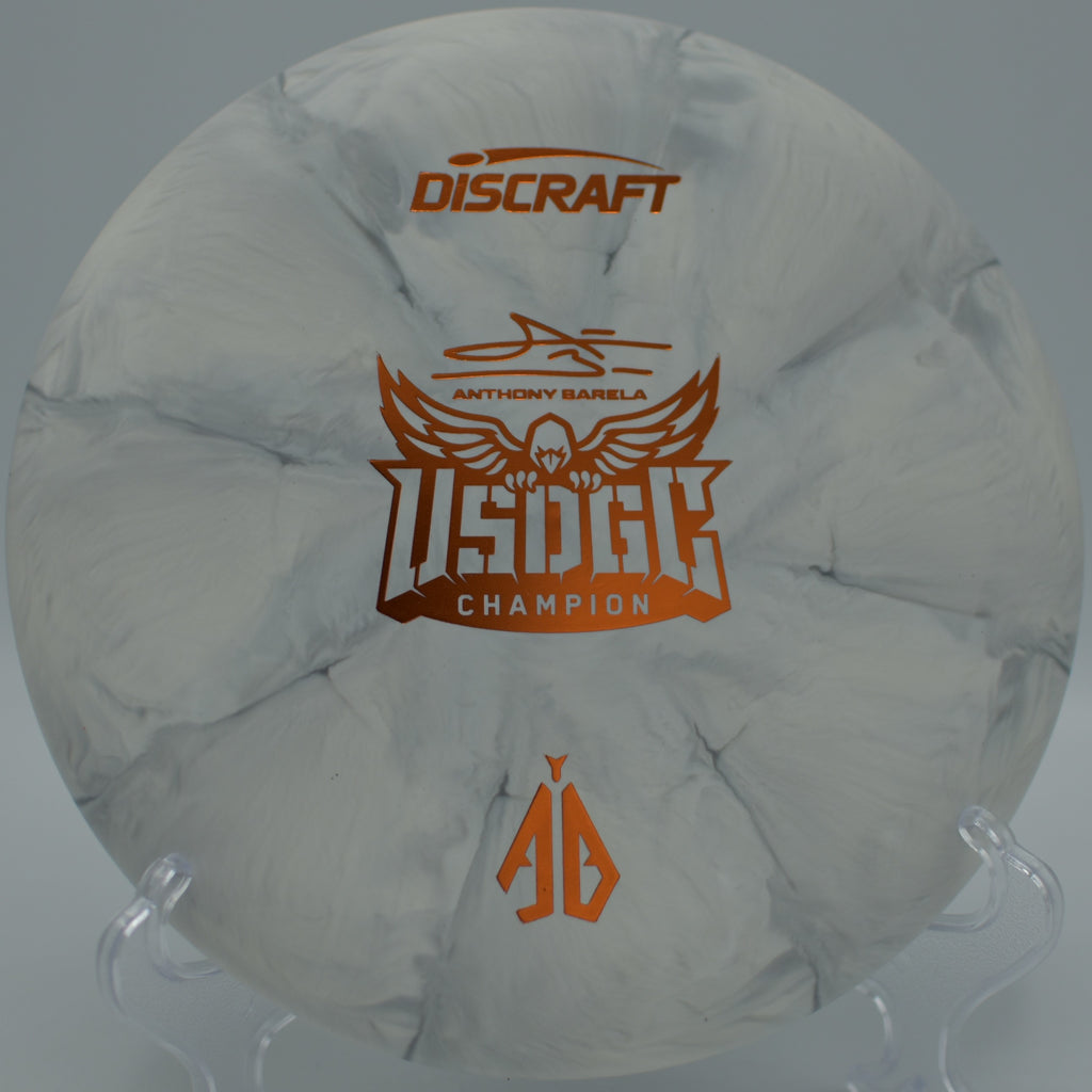 Discraft CT Swirl Focus putter resting on the tee at Shawnee State Park DGC in West Portsmouth, OH, showcasing its slightly overstable 2-speed approach flight.