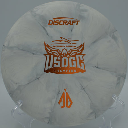 Discraft CT Swirl Focus putter resting on the tee at Shawnee State Park DGC in West Portsmouth, OH, showcasing its slightly overstable 2-speed approach flight.