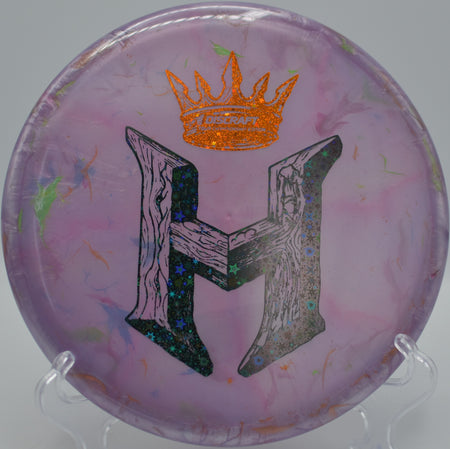 2025 DGPT Final Holyn Handley Big Z JB Zone SS resting on the tee pad at Kensington Toboggan DGC in Milford, MI, showcasing its stable-to-neutral 4-speed approach flight.