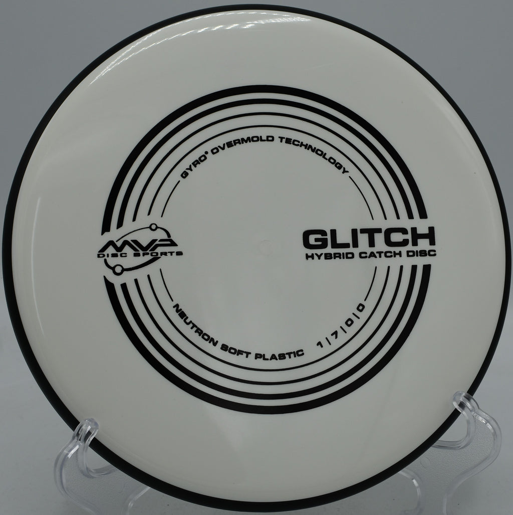 MVP Neutron Glitch catch-and-throw disc gliding effortlessly down the fairway at Maple Hill Disc Golf Course in Leicester, Massachusetts.