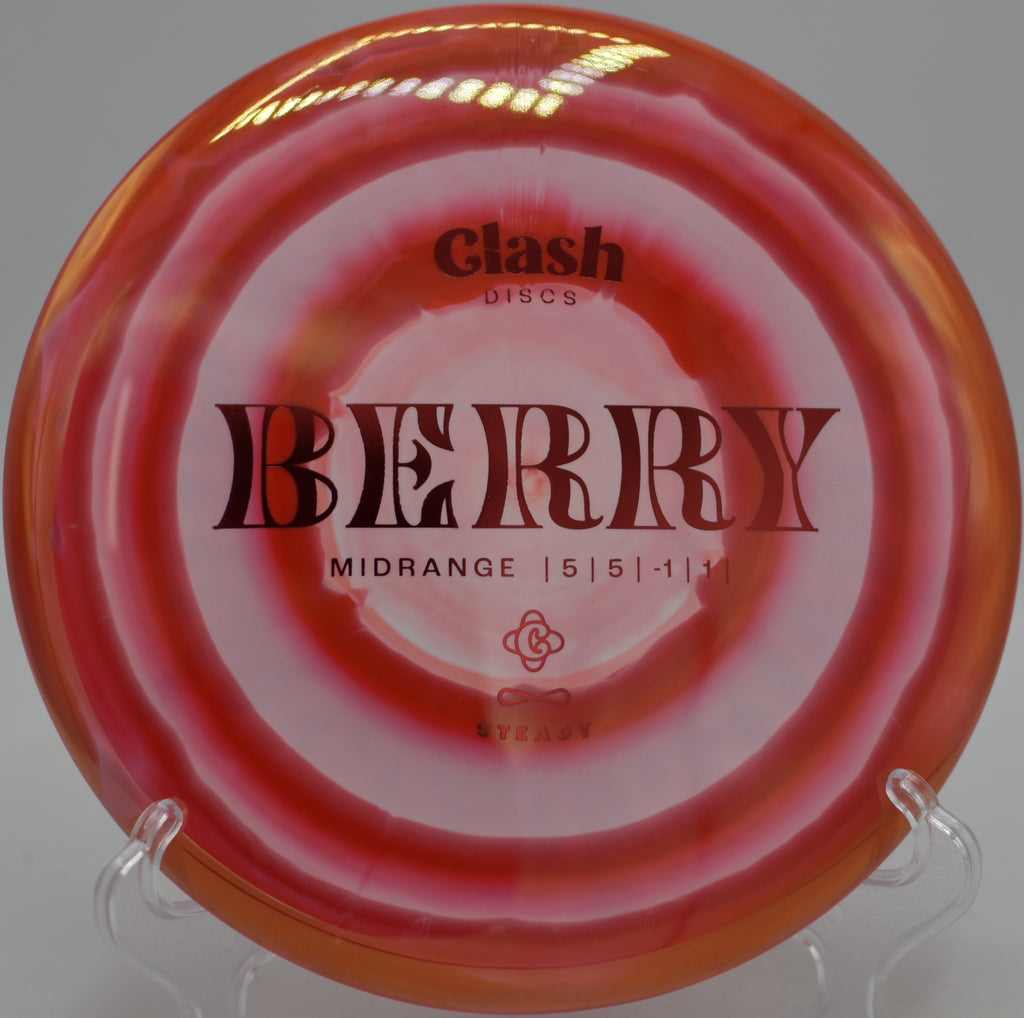 Clash Discs Berry midrange flying straight at Maple Hill Disc Golf Course in Leicester, Massachusetts