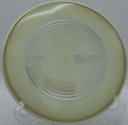 MVP Eclipse Glitch glow putter floating straight at Maple Hill Disc Golf Course in Leicester, Massachusetts