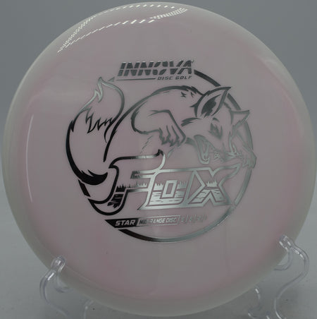 Innova Star Fox midrange launched on a straight control shot at Maple Hill Disc Golf Course in Leicester, Massachusetts.