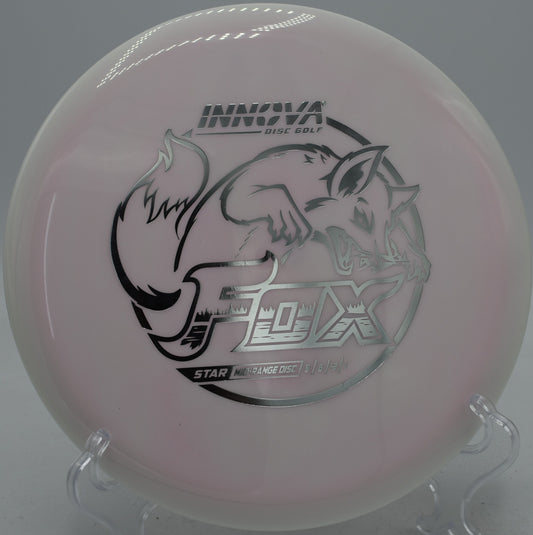 Innova Star Fox midrange launched on a straight control shot at Maple Hill Disc Golf Course in Leicester, Massachusetts.