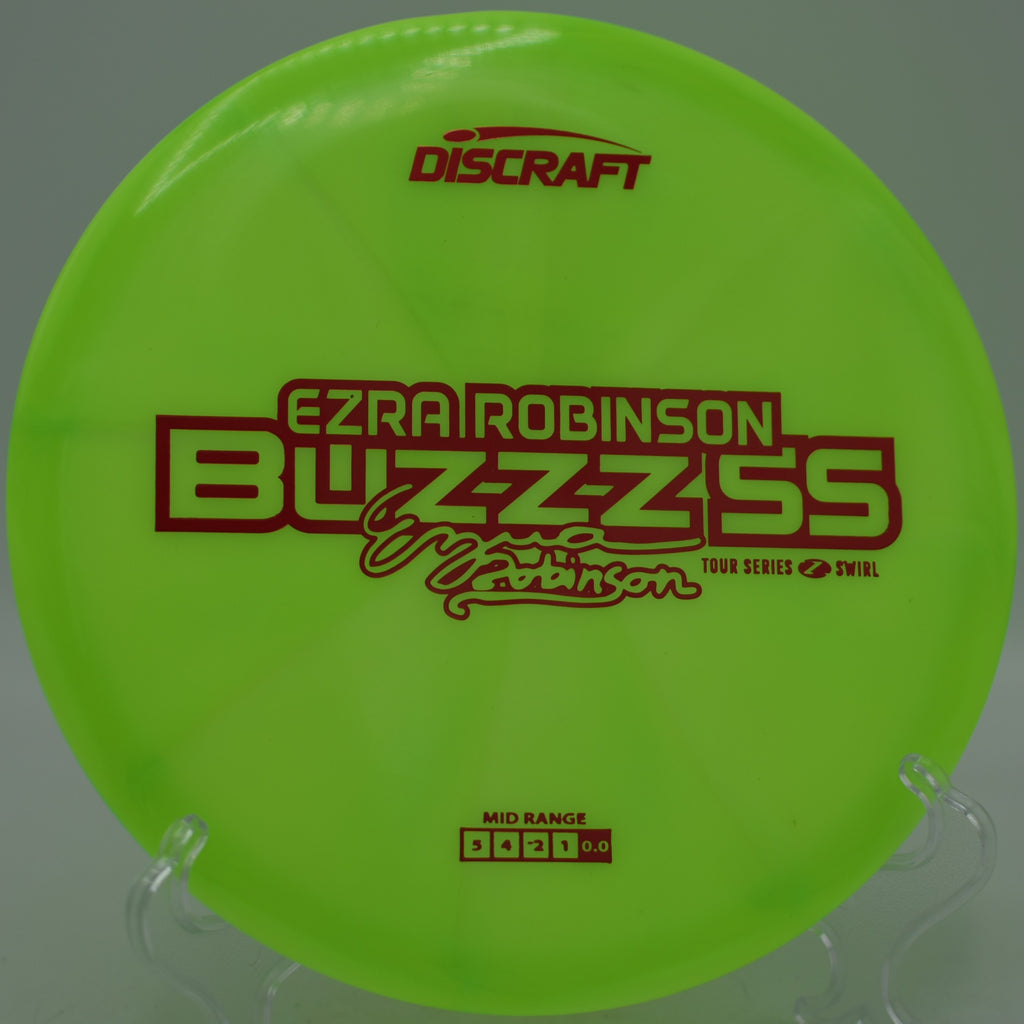 Discraft Ezra Robinson Z Swirl Buzzz SS 2025 placed perfectly on a straight midrange line at Smugglers’ Notch Disc Golf Center in Jeffersonville, Vermont.