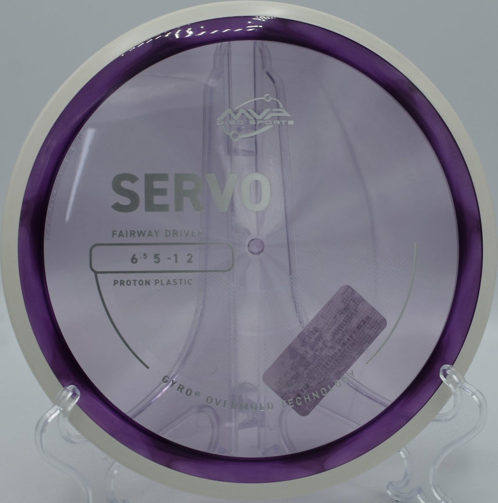 Proton Servo fairway driver carving a tight tunnel shot at Hidden Lake Disc Golf Course in Burlington, North Carolina, holding neutral stability with clean forward fade