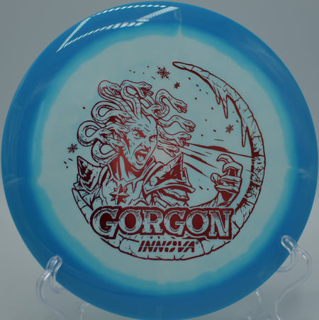 Holiday Edition Halo Star Gorgon launching off the tee at Blue Ribbon Pines DGC in East Bethel, MN, carving a long straight line with late, reliable fade.