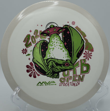 Axiom OTB Open 2026 Fission Delirium distance driver displayed on tee pad at Maple Hill Disc Golf Course in Leicester, Massachusetts