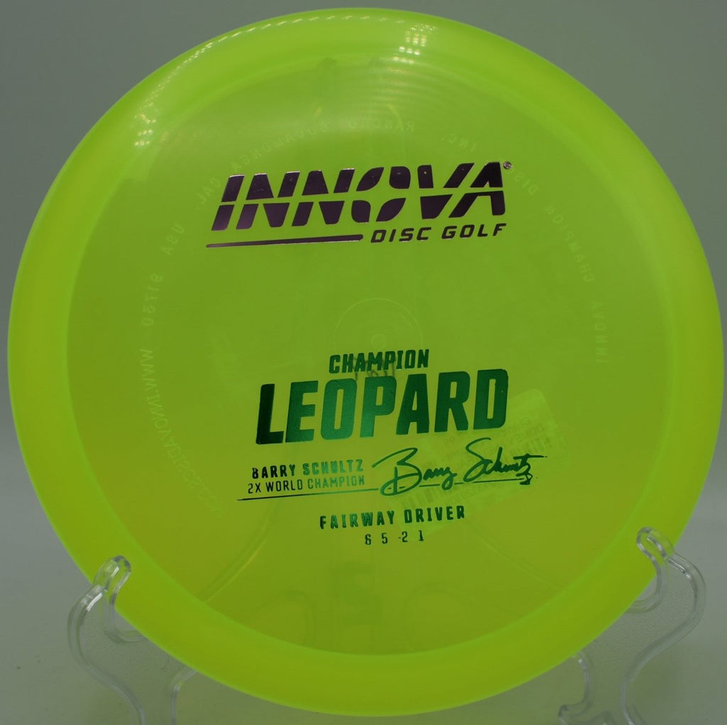 Champion Leopard fairway driver shaping a turnover approach shot at Tumble Tree Disc Golf Course in Iowa City, Iowa