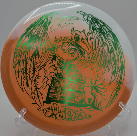 Halloween Duo Roc3 midrange flying on a stable approach at Maple Hill Disc Golf Course in Leicester, Massachusetts.