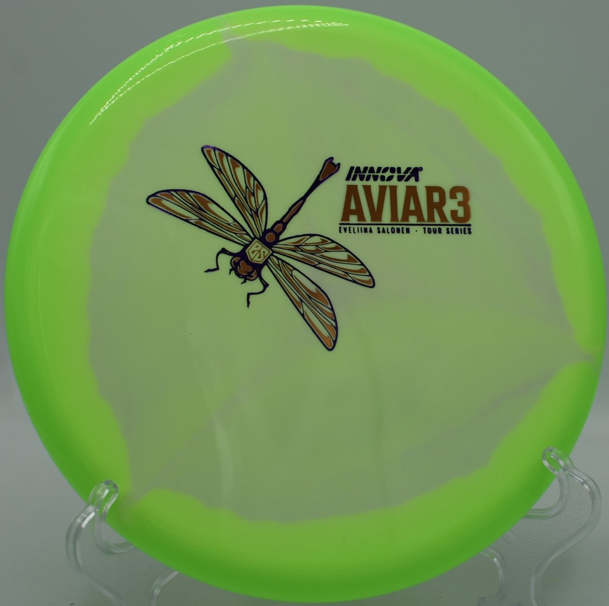 Classic Glow Halo Star Aviar3 Eveliina Salonen Tour Series putter parked under basket chains after a headwind putt at McPherson Park Disc Golf Course in Wellington, Kansas