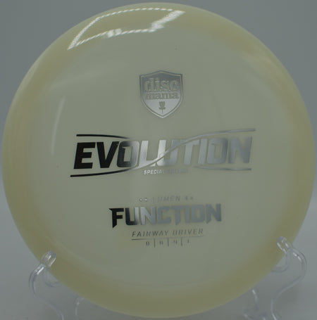 Discmania Neo Lumen Function control driver gliding smooth anhyzers at Hornets Nest Disc Golf Course in Charlotte, North Carolina.