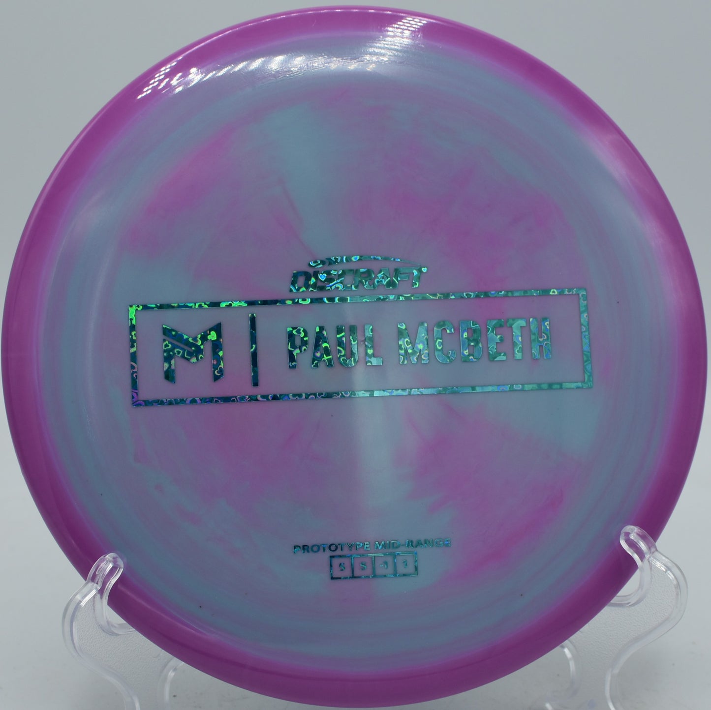Paul McBeth Prototype Malita flying straight on a hyzer flip release at Pier Park Disc Golf Course in Portland, Oregon