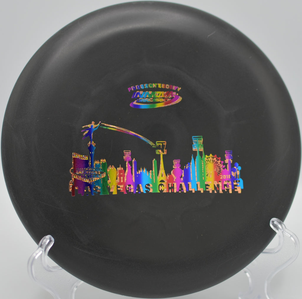 Black DX Aviar about to hit the pole at San Luis Obispo Disc Golf Course in San Luis Obispo, California.