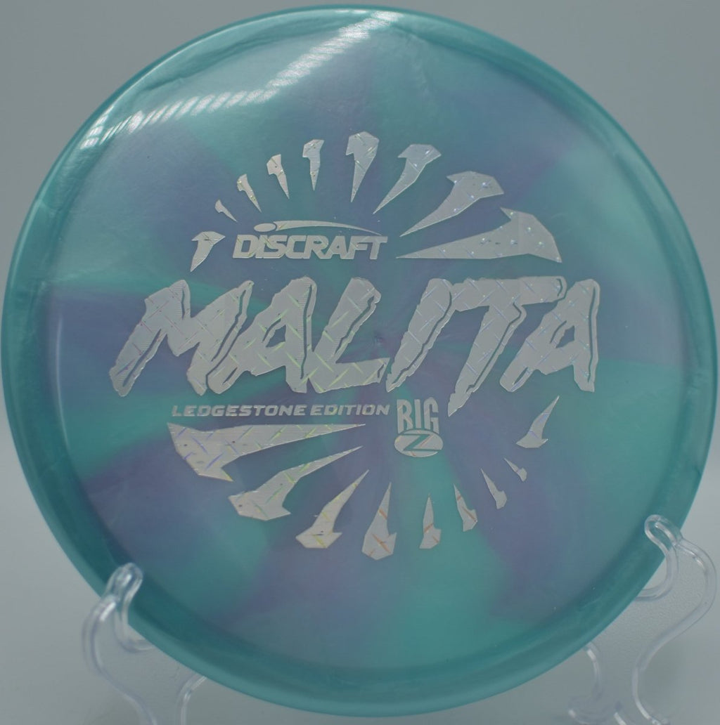 Paul McBeth Big Z Swirl Malita midrange showing smooth glide and minimal fade on a wooded fairway at Harmony Bends Disc Golf Course in Columbia, Missouri