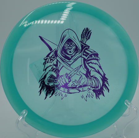 Classic Glow Dark Rebel hyzer-flipping clean at Adair Park DGC in Corvallis, OR, pushing a laser-straight line under the tree canopy.