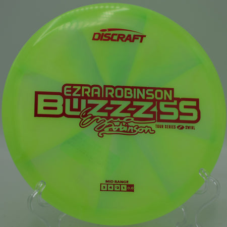 2025 Z Swirl Buzzz SS Ezra Robinson powering a controlled drive at North Cove Disc Golf Course in Marion, North Carolina.