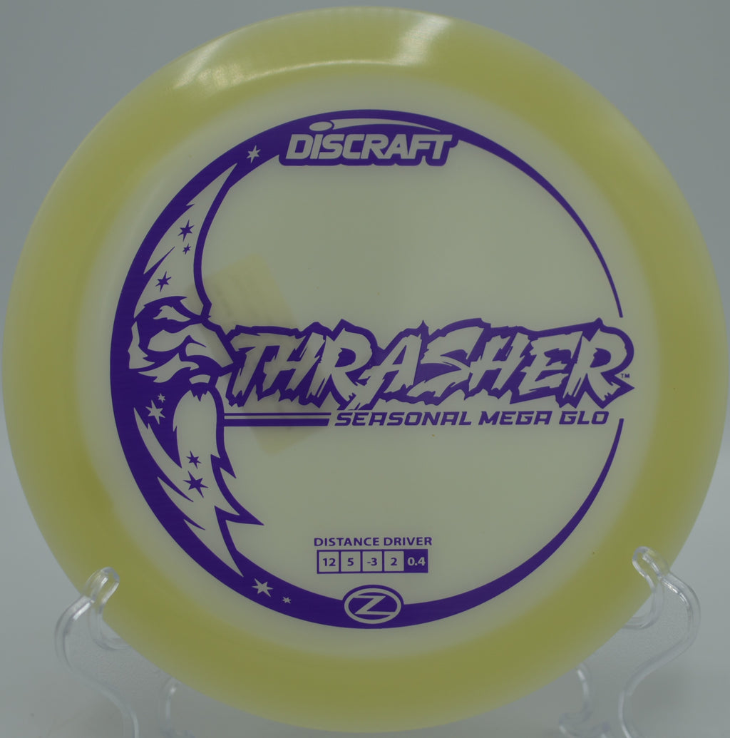 Mega Glow Z Thrasher streaking across the night sky on a long turnover at Fountain Hills Disc Golf Course in Fountain Hills, Arizona.