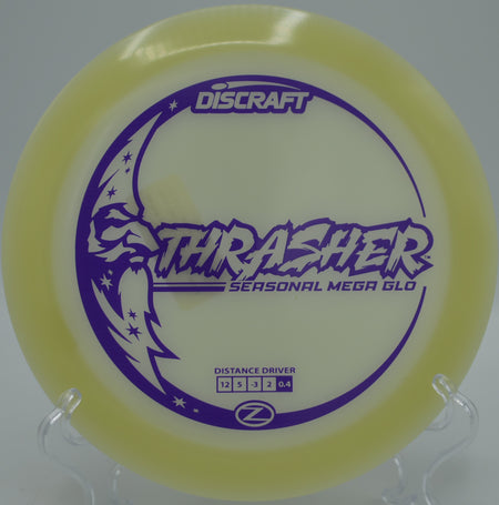 Mega Glow Z Thrasher streaking across the night sky on a long turnover at Fountain Hills Disc Golf Course in Fountain Hills, Arizona.