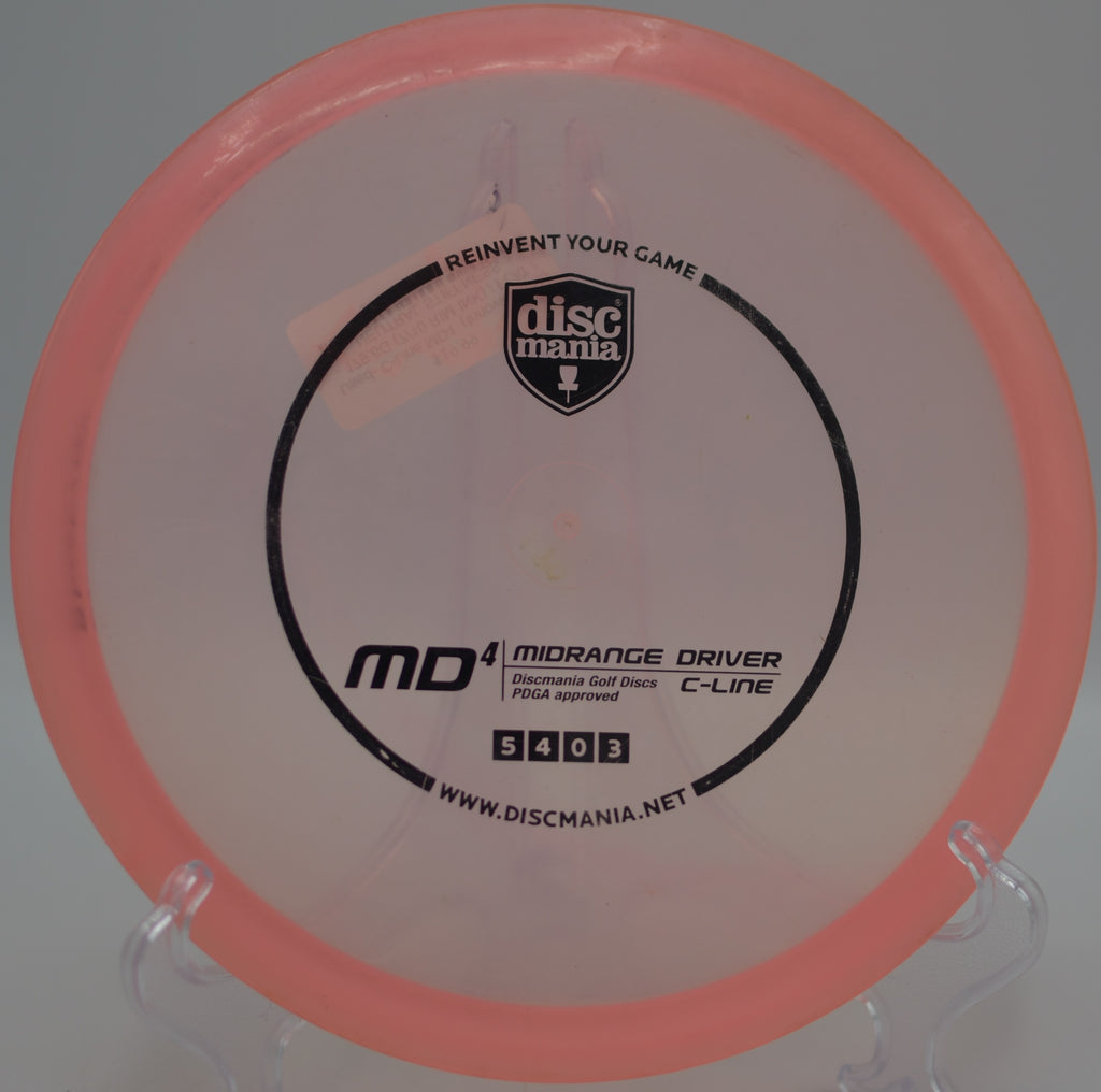 Used C-Line MD4 (Innova Made) gliding smoothly toward the chains on a controlled approach at Milo McIver State Park Disc Golf Course in Estacada, Oregon.