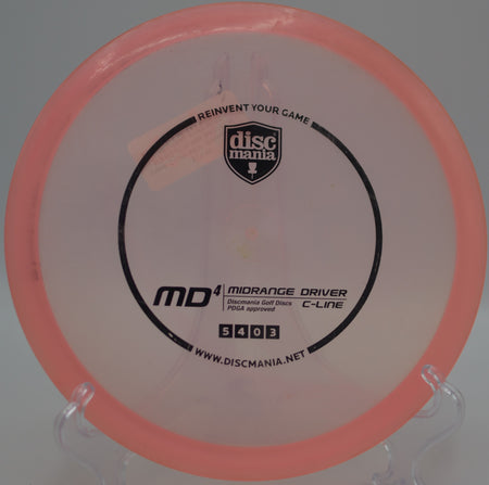 Used C-Line MD4 (Innova Made) gliding smoothly toward the chains on a controlled approach at Milo McIver State Park Disc Golf Course in Estacada, Oregon.