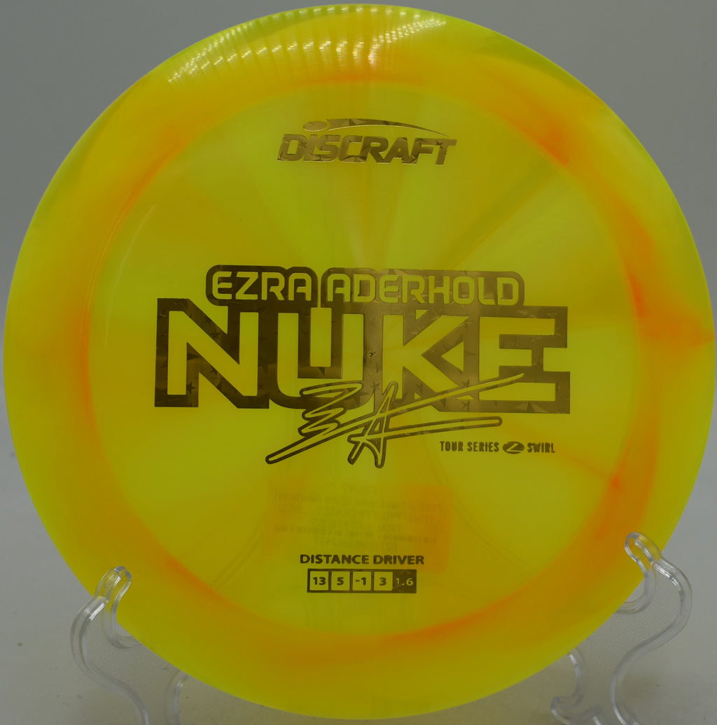 2025 Z-Swirl Nuke Ezra Aderhold signature edition flying massive hyzer flips across the open fairways at Fountain Hills Disc Golf Course in Fountain Hills, Arizona.