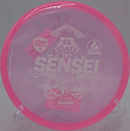 Clear Premium Sensei by Discmania gliding toward the basket on hole 5 at Milo McIver State Park Disc Golf Course in Estacada, Oregon.