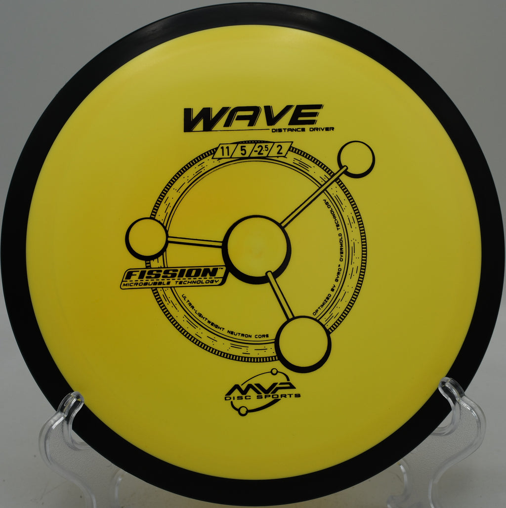 Fission Wave distance driver soaring on a controlled hyzer flip at Maple Hill Disc Golf Course in Leicester, Massachusetts.