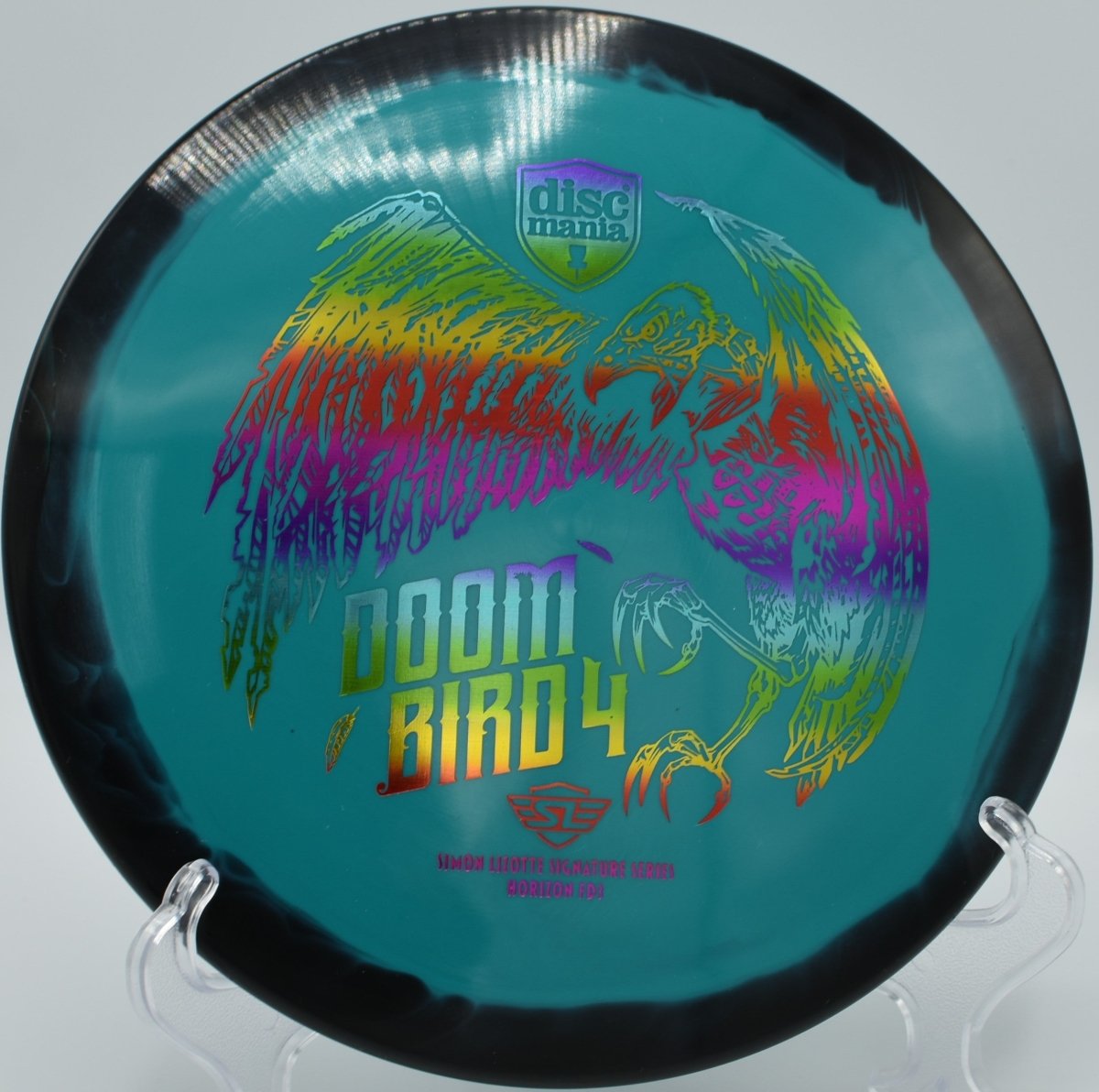 Discmania Doombird 4 displayed at Harmony Bends DGC, Columbia MO for controlled fairway placement and spike hyzers