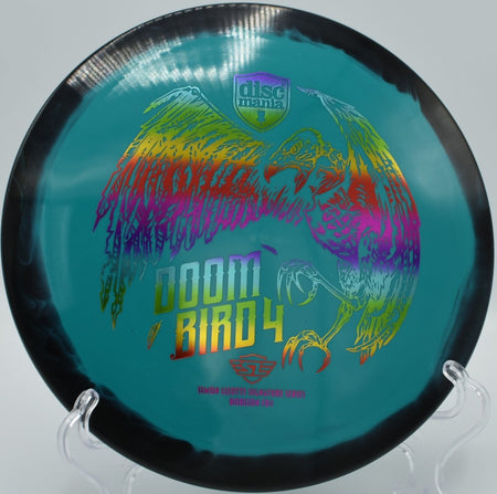 Discmania Doombird 4 displayed at Harmony Bends DGC, Columbia MO for controlled fairway placement and spike hyzers