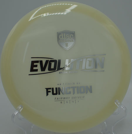 Neo Lumen Function Discmania glow plastic fairway driver floating straight shots at Water Works Park Disc Golf Course in Kansas City, Missouri.