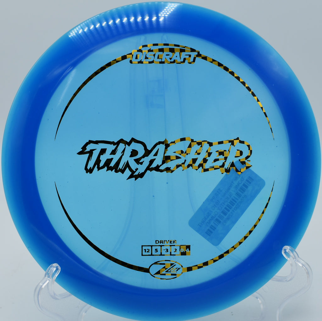 Z Lite Thrasher – Glidey understable driver ideal for long S-curves at Sandy Point Disc Golf Ranch in Wisconsin.

