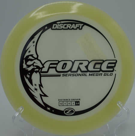 Mega Glow Z Force glowing bright as it rips down the fairway at Blue Ribbon Pines Disc Golf Course in East Bethel, Minnesota.