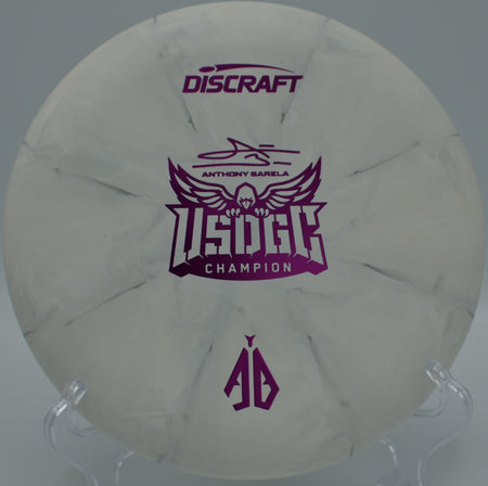 CT Swirl Focus photographed near the basket at Lincoln Park DGC in Minot, ND, highlighting its straight-to-fade putting control.