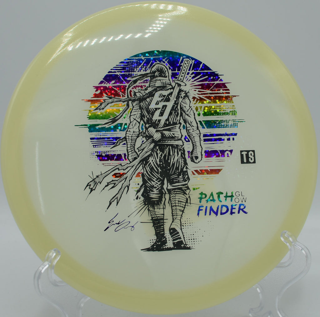 Eric Oakley Signature Glow Pathfinder carving a clean line through the woods at North Cove Disc Golf Club in Marion, North Carolina

