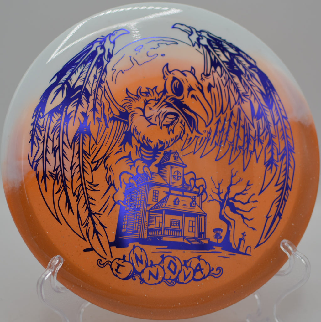 Innova Halloween Duo Roc3 glowing seasonal stamp on a midrange shot at Water Works Park Disc Golf Course in Kansas City, Missouri.