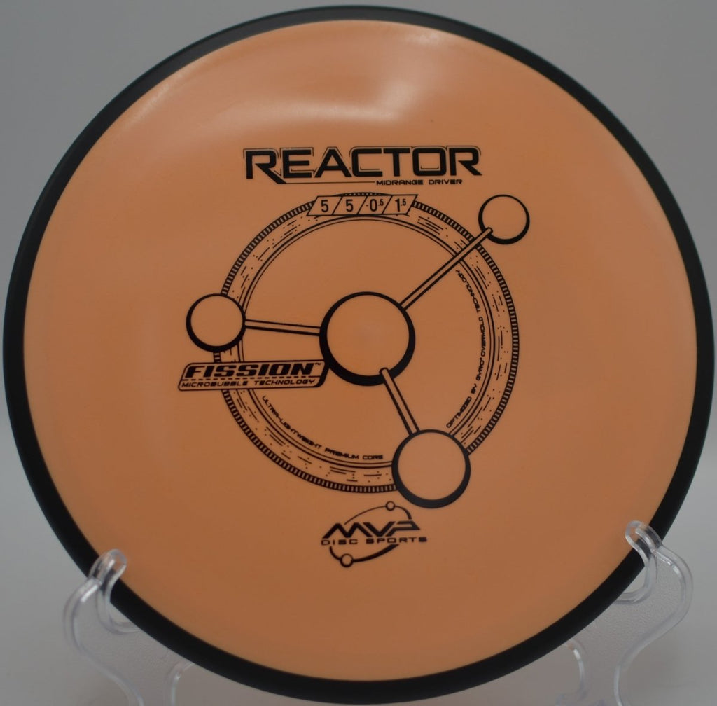 Fission Reactor midrange from MVP holding torque-resistant stability on a wooded fairway at Harmony Bends Disc Golf Course in Columbia, Missouri