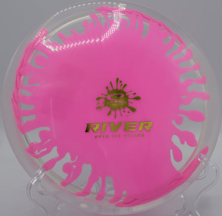 Opto-Ice Splash River gliding through a wooded tunnel at Maple Hill Disc Golf Course in Leicester, Massachusetts, showcasing its effortless turn and premium burst plastic.

