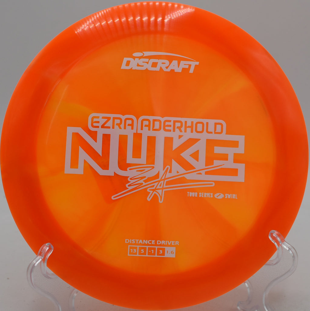Ezra Aderhold signature Z-Swirl Nuke 2025 edition sailing with huge glide over the hills at Milo McIver Disc Golf Course in Estacada, Oregon.