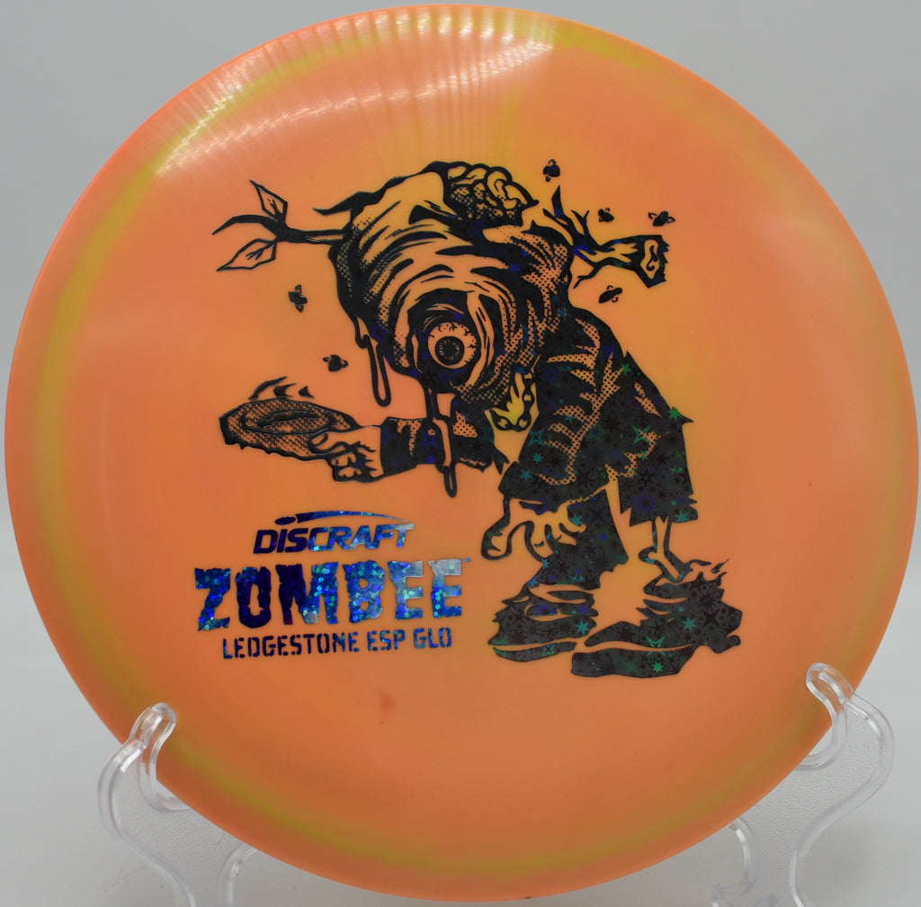 Discraft ESP Glo Zombee sailing under moonlight at Pier Park Disc Golf Course in Portland, OR.