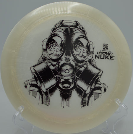 Big Z Nuke flying with power and precision over rolling terrain at Waterworks Park Disc Golf Course in Kansas City, Missouri.